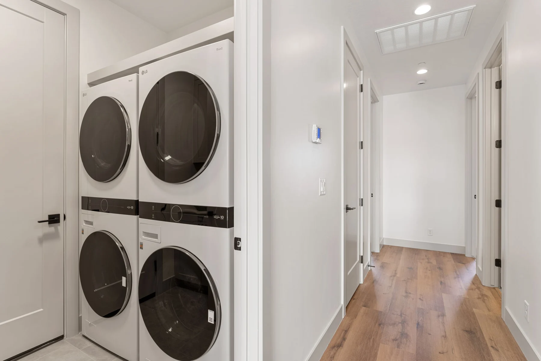 Laundry room with washer and dryer – Isle 64 vacation rental in Washington, Utah near St. George and Zion