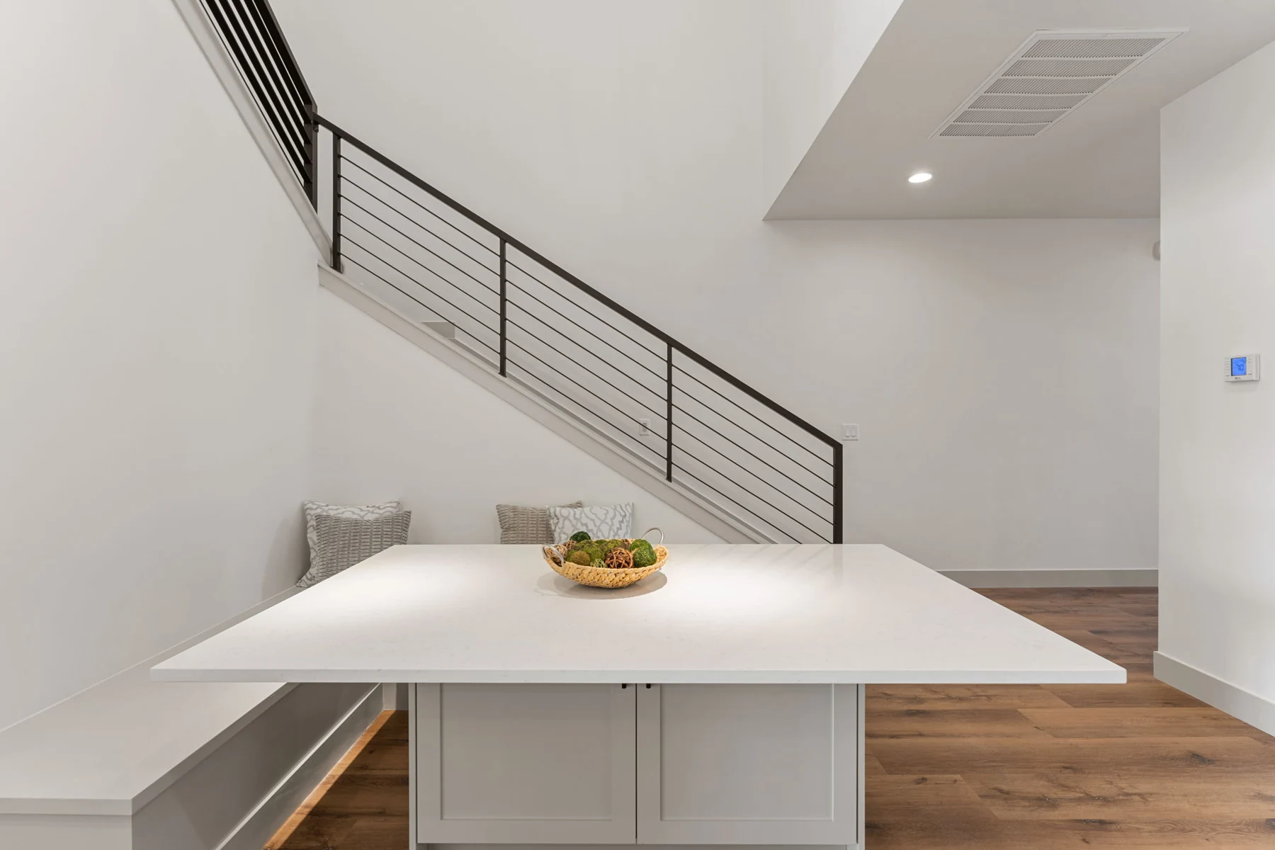 Kitchen island and dining nook – Isle 64 vacation rental in Washington, Utah near St. George and Zion