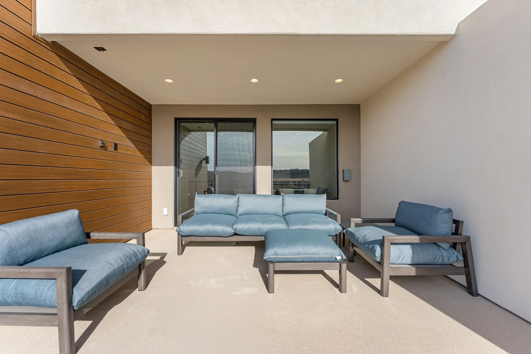 Covered balcony with outdoor sectional – Isle 64 vacation rental in Washington, Utah near St. George and Zion