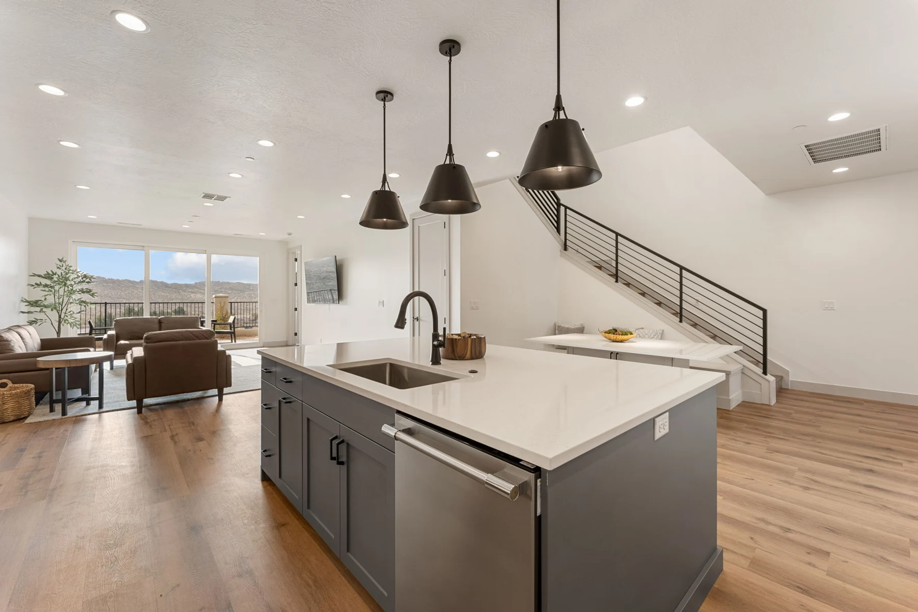 Open-plan kitchen with island seating – Isle 64 vacation rental in Washington, Utah near St. George and Zion